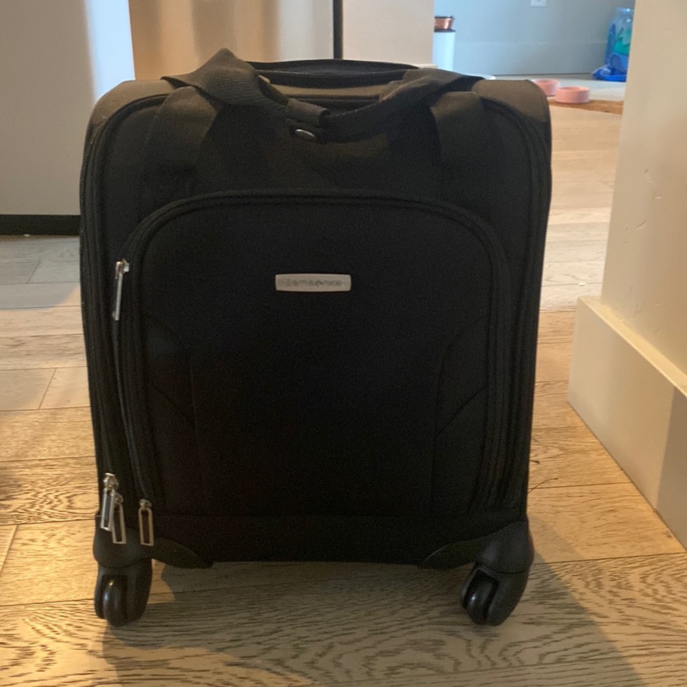 Never used brand new Samsonite Underseat Carry-On Spinner with USB Port